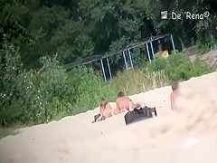 Voyeur at nudist beach films nude men and woman
