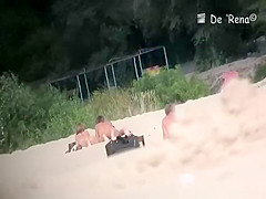 Voyeur at nudist beach films nude men and woman