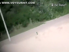 Voyeur at nudist beach films nude men and woman