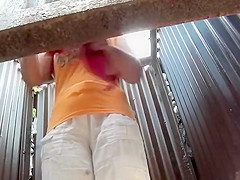 Chubby woman undressing in a cabin