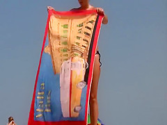 Amazing topless girl at a beach
