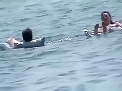 Nudist girls enjoying the water
