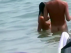 Nudist girls enjoying the water