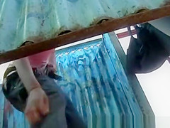 Girl dresses up in the locker room