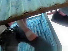 Girl dresses up in the locker room