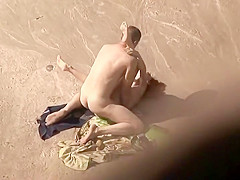 Quirky redhead fucked on a beach