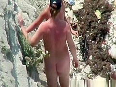 Two nudist women posing for pictures