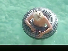 Hot ass blonde playing in the water