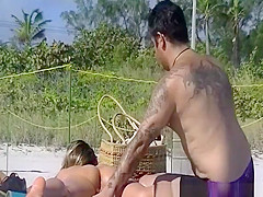 Man puts cream on hot wife's body