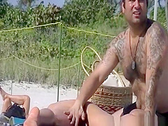 Man puts cream on hot wife's body