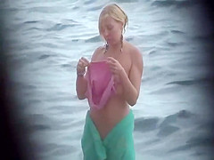 She wraps a towel around her body