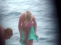 She wraps a towel around her body