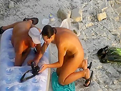 They are filming themselves on a beach