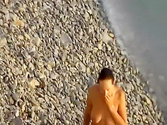 They are filming themselves on a beach