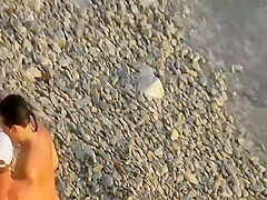 They are filming themselves on a beach