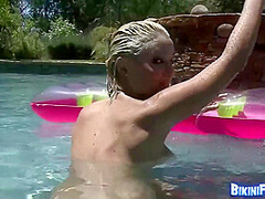 Big-titted Babe With Clean Bald Pussy Hoochie-coochie On The Pool