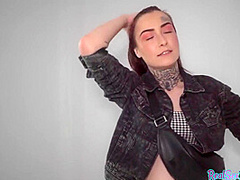 Redhead with tattoos and piercings receives doggystyle fuck