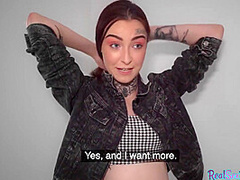 Redhead with tattoos and piercings receives doggystyle fuck