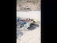 Topless beach sunbathing