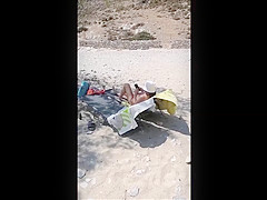 Topless beach sunbathing