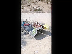 Topless beach sunbathing