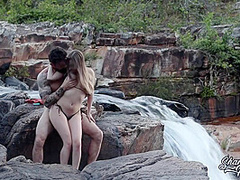 Blonde With Big Natural Breasts Makes Risky Public Sex In A Public Waterfall
