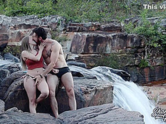 Blonde With Big Natural Breasts Makes Risky Public Sex In A Public Waterfall