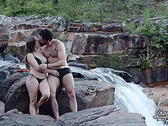 Blonde With Big Natural Breasts Makes Risky Public Sex In A Public Waterfall