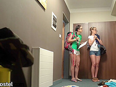 Hostel babes fucking roommate in public threesome room