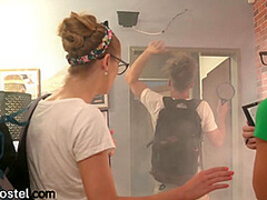 Hostel babes fucking roommate in public threesome room