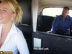 Euro cabbie riding in interracial couple on the backseat