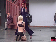 Public slut humiliated on the street by her strict domina