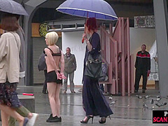 Public slut humiliated on the street by her strict domina