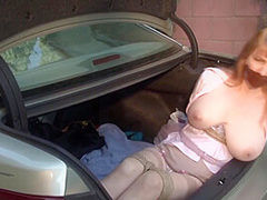 Woman Tied Up And In The Back Of A Car