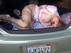 Woman Tied Up And In The Back Of A Car