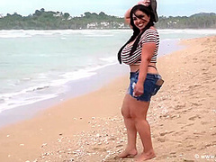 Busty Brunette, Isabella Is Posing Topless On The Beach And