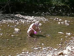 Masturbating With Wolf Dildo In Creek