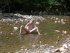Masturbating With Wolf Dildo In Creek