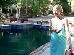 Blonde teen masturbating in outdoor pool