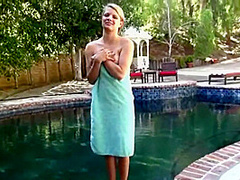 Blonde teen masturbating in outdoor pool