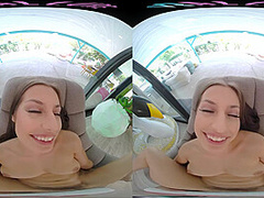 Fit brunette removes her bikini and masturbates in virtual reality