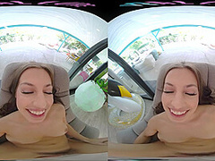 Fit brunette removes her bikini and masturbates in virtual reality