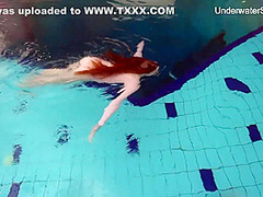 Redhead Simonna Showing Her Body Underwater