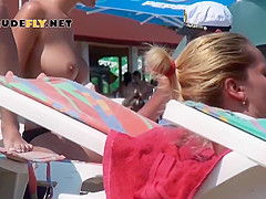 Nude Beach Chck Sunbathing Topless