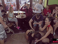 Publicly humiliated sub sucking cock with voyeurs watching