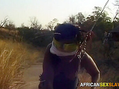 Taking this ebony bitch outdoor for a walk and a spanking