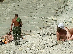 Horny people on the beach having fun