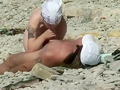 Horny people on the beach having fun