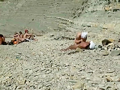 Horny people on the beach having fun