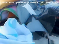 Hot brunette with nice body sunbathing